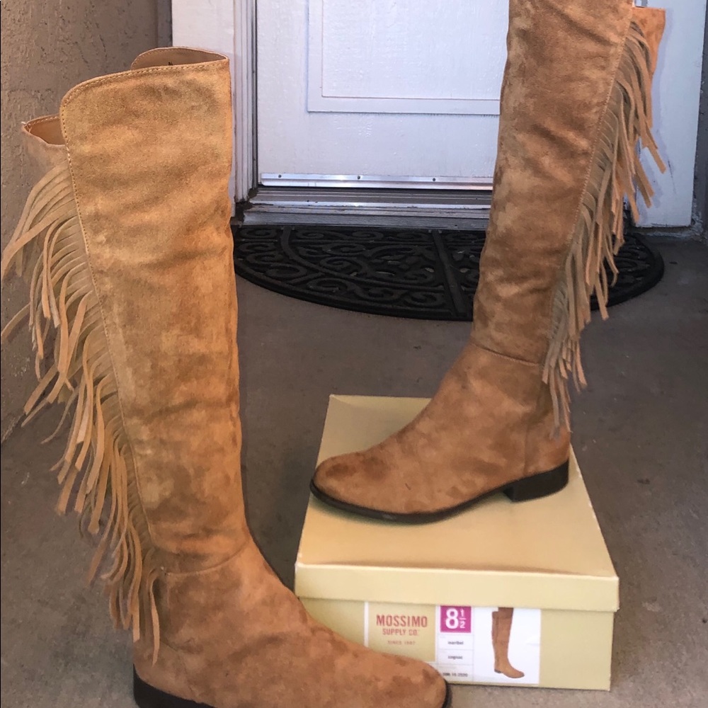 Over the knee fringe boots